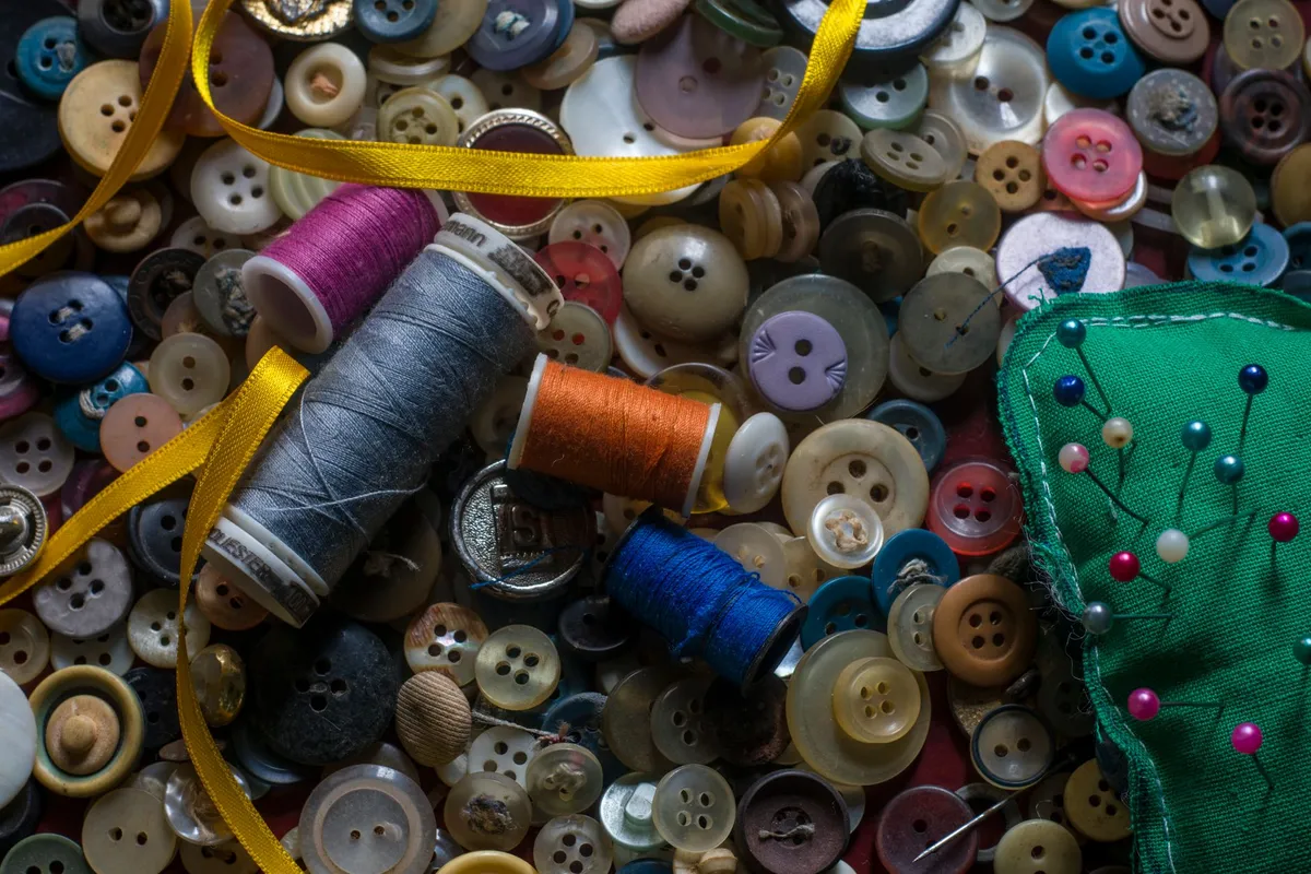 How to sew on a button: two-hole, four-hole and shank buttons