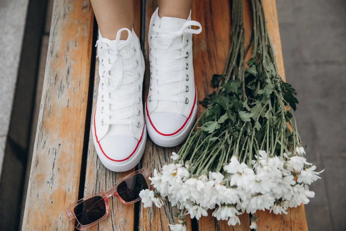 Outfit idea: floral high-top wedges, denim shirt and a black dress